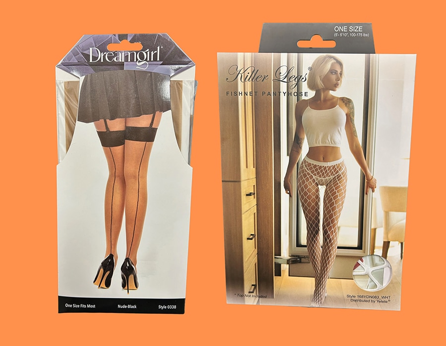 Two packages of hosiery: a Dreamgirl box showing sheer nude stockings with a black back seam, and a Killer Legs box showing white fishnet pantyhose.